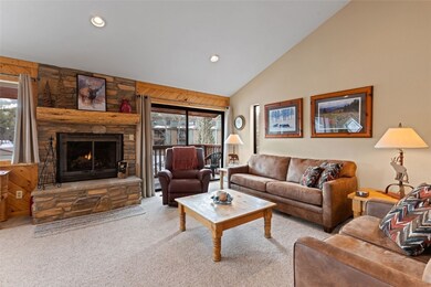 Enjoy ski slope views while warming by the fire.