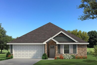 View of front of home featuring a garage, driveway, brick siding, and a front lawn
