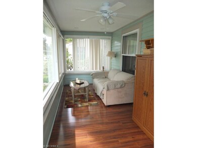 Enclosed front porch/family room.
