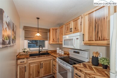 New kitchen cabinets, counter top and stove