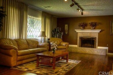 FORMAL LIVING ROOM, WOODEN FLOORS AND TRAVERTINE F
