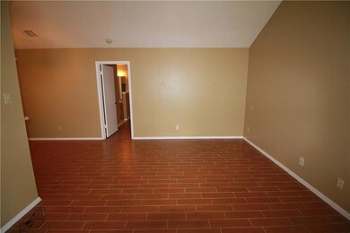 Unfurnished room featuring baseboards