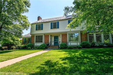 Exterior features include copper downspouts and gu