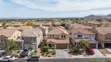 Aerial perspective of suburban area with a mountai