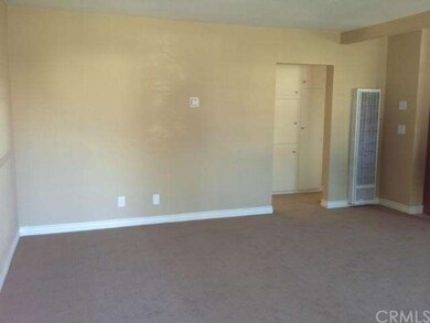 View #3 of living room showing new carpet and new 