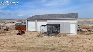 Detached oversized garage with dog kennels