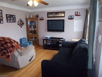 Living Room with Cove Ceiling and Recessed Lights