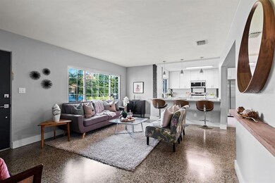 Open floorplan! Gorgeous restored terrazzo floors! Brand new kitchen!