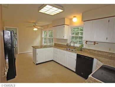 Kitchen - Smooth surface range, double sink with g