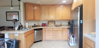 Beautiful cabinets. tile counters