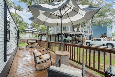 Wooden deck featuring a yard