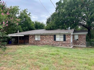 View of front of house with a front yard