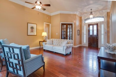 A View Back to the Impressive Entry and the Study Through the French Doors.