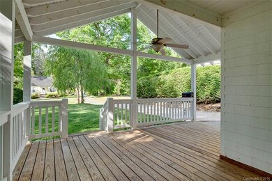 plenty of room for enjoying the outdoors from this front porch