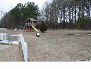 Wonderful Backyard for kids to play. Swing set Conveys,wooden play set does not convey.