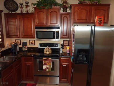 Staggered Cherry Cabinets