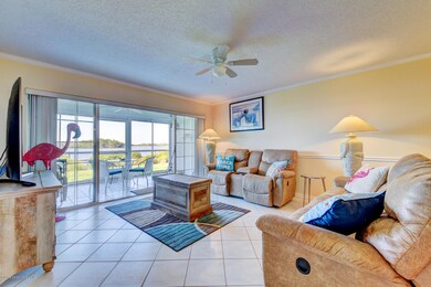 living room with sliders to porch