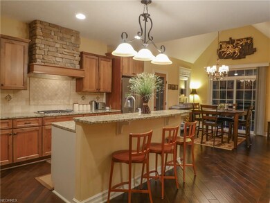 This warm and practical kitchen has a large island