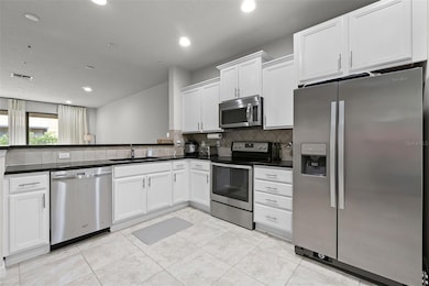 717 Virtuoso Ln unit 85, Orlando, FL 32824 - photo 2