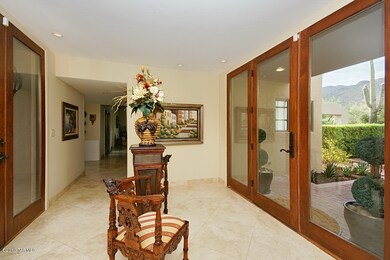 Entry foyer to the east side of the home