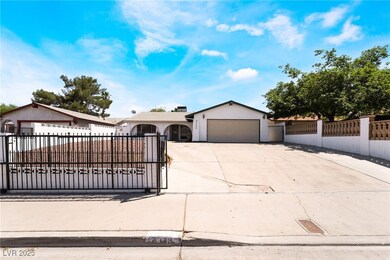 Ranch-style home featuring a fenced front yard, a