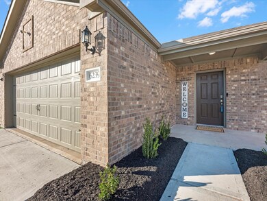 enjoy a tasteful front patio, with plenty of room to decorate for all occasions!