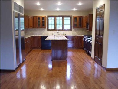Kitchen countertops & center island have new grani