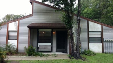 End Unit with covered Front porch and LOTS of wind