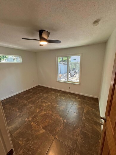Spare room featuring a textured ceiling, ceiling 