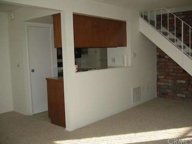 Kitchen opens to family room and dining area.