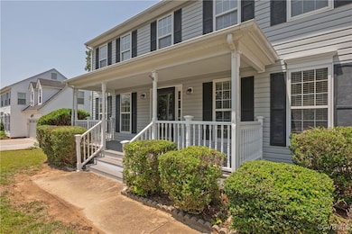 View of front of home featuring covered porch