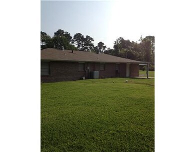Exterior Back. 9 x 9 covered patio