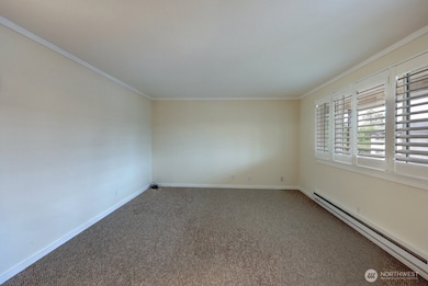 Living room with new carpet, blinds and paint