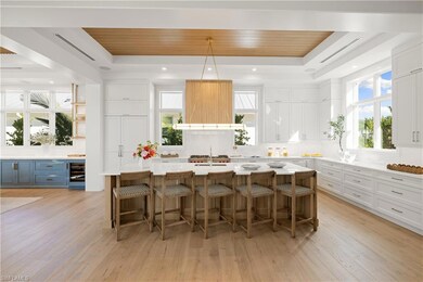 Sub Zero, 6 burner Wolfe range, Miele dishwasher, Waterstone faucet, oak ceiling.