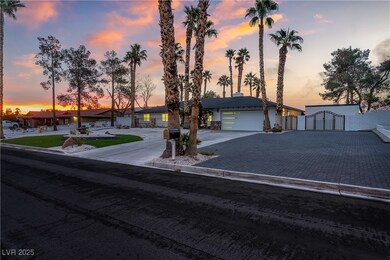 View of front of home with driveway, an attached g