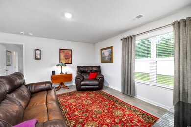 Living room featuring hardwood / wood-style floors