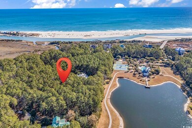 Aerial view with a beach view and a water view