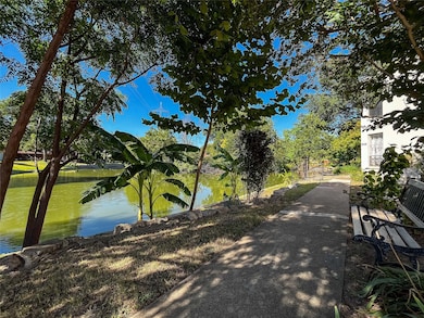 Surrounding community featuring a water view