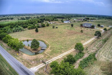 10 Acre AG EXEMPT land with pond, 5274 Sq Ft home and ready for your cattle or horses.
