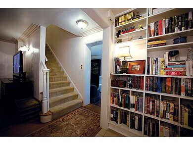 Entry/Foyer. Abundance of shelving, crown moulding