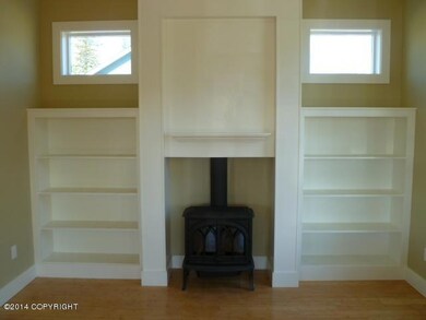Living Room Stove & Bookshelves
