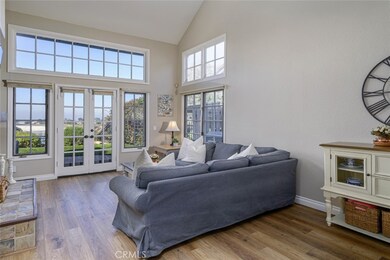 The expanse of windows permit an abundance of natural lighting and panoramic views of the backyard.