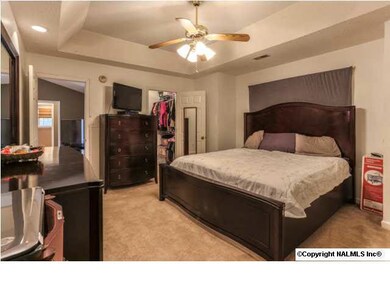 Master Suite with large walk in closet and bathroom.