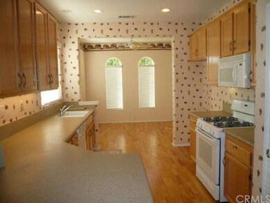 Beautiful kitchen with hardwood floors, breakfast 