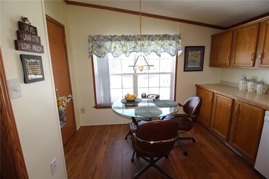 Eat-in kitchen.  Note the gorgeous new floors!