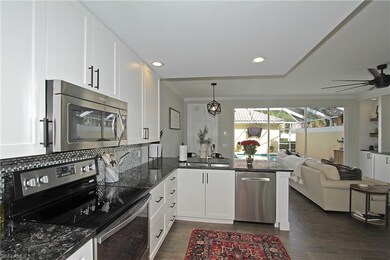 View of Kitchen and open floorplan with lots of na