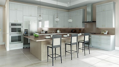 Rendering: Kitchen with stainless appliances and m