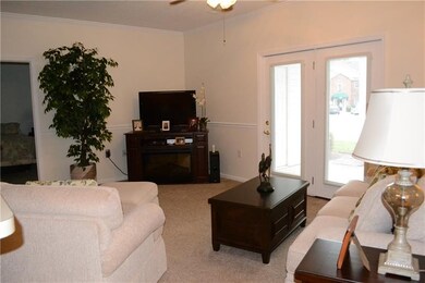 A light and airy living room! Access to the front 