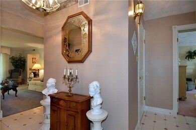 The welcoming foyer is 12' x 4.