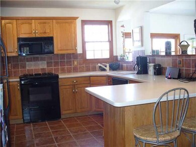 Kitchen. Kitchen with ceramic tiles, corian tiles,
